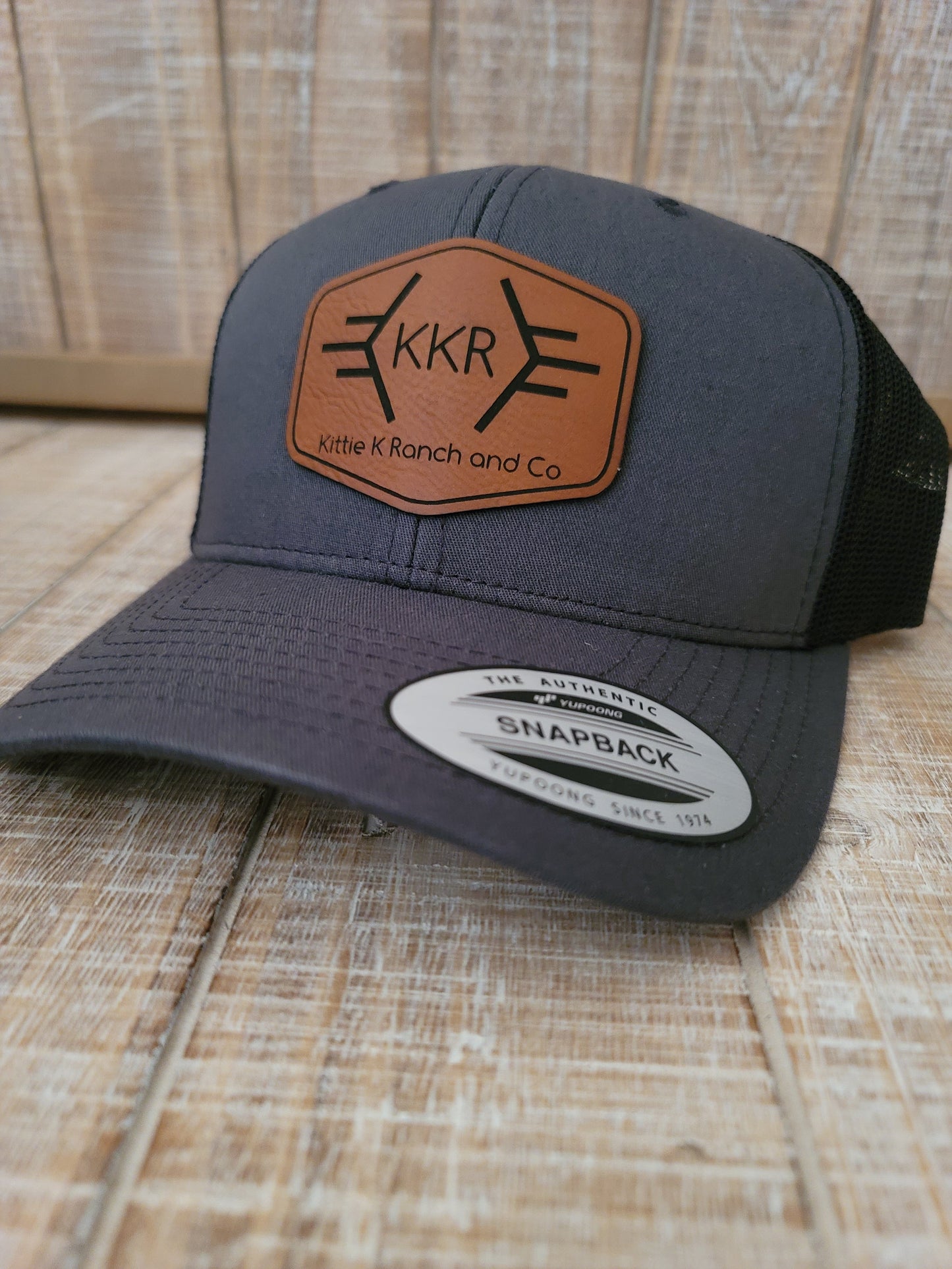 KITTIE K RANCH AND CO LEATHER PATCH SNAPBACK HAT